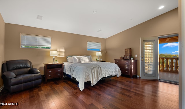 bedroom featuring access to outside, dark hardwood / wood-style floors, and lofted ceiling