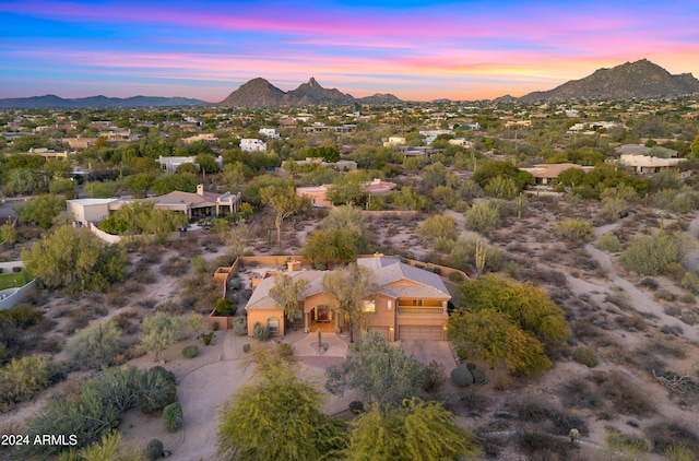 aerial view at dusk with a mountain view