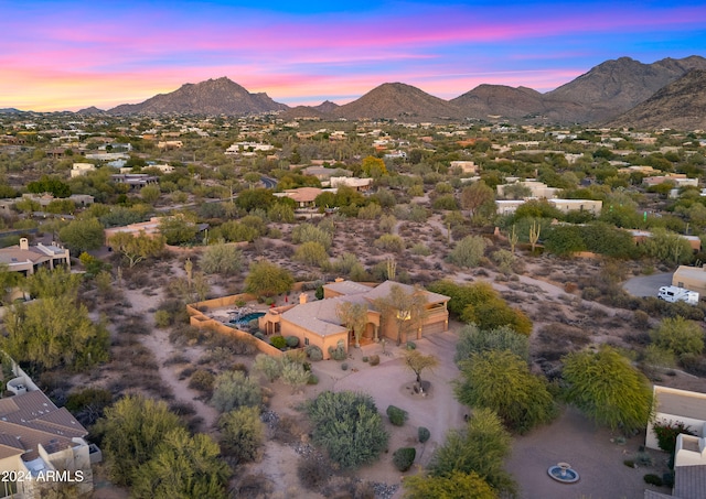 aerial view at dusk with a mountain view