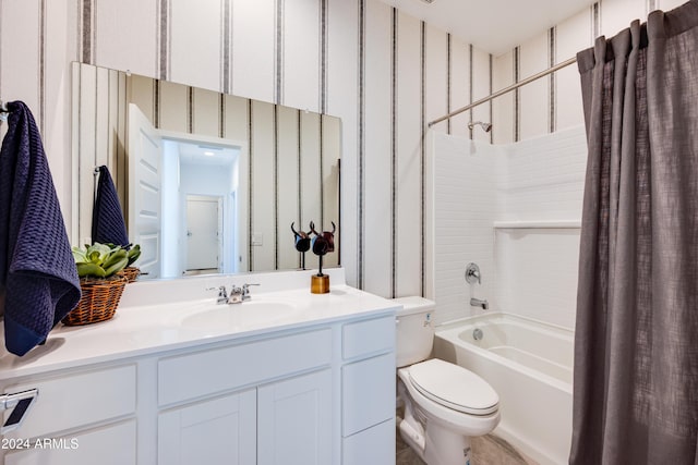 full bathroom with shower / tub combo, vanity, and toilet