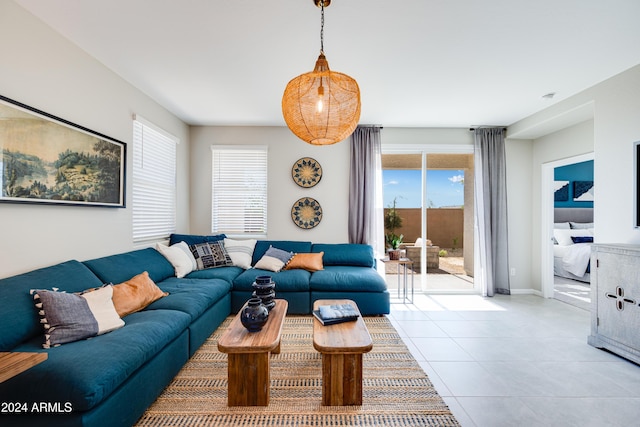 living room with light tile patterned flooring and a wealth of natural light