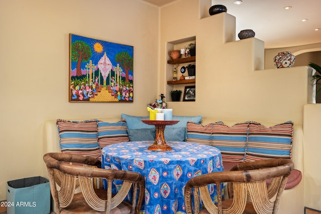 dining area featuring built in shelves