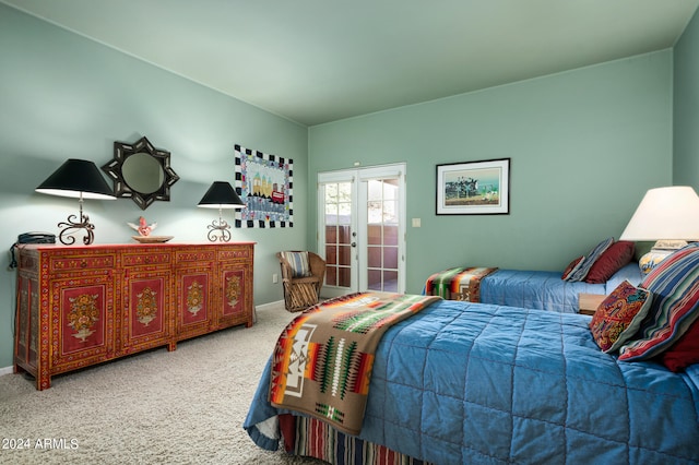 bedroom with french doors and carpet floors