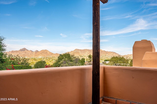 balcony featuring a mountain view