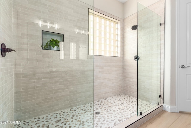 bathroom with an enclosed shower