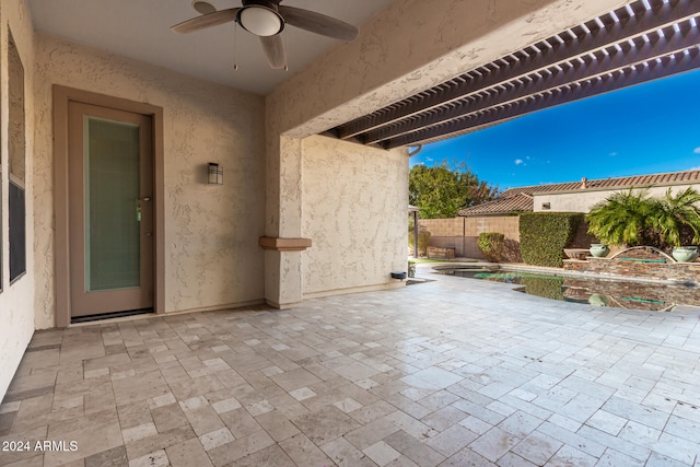 view of patio / terrace featuring ceiling fan