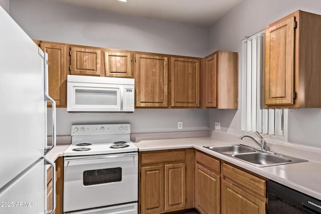 2929 W Yorkshire Dr Unit 2074, Phoenix, AZ 85027 - kitchen with white appliances, a sink, light countertops, and brown cabinetry