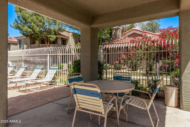 2929 W Yorkshire Dr Unit 2074, Phoenix, AZ 85027 - view of patio featuring fence and outdoor dining space