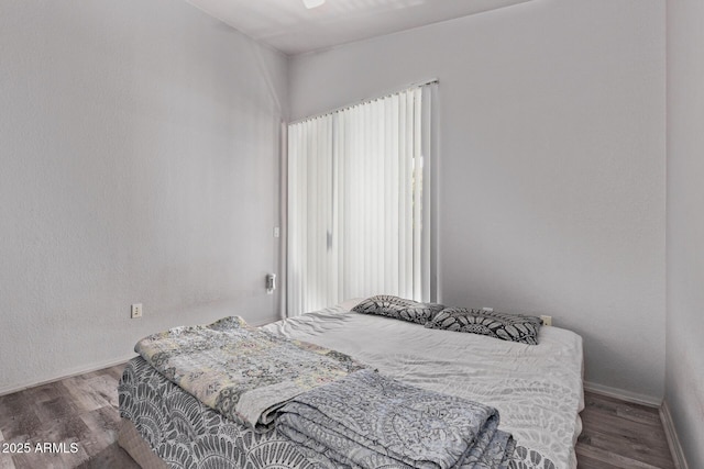 2929 W Yorkshire Dr Unit 2074, Phoenix, AZ 85027 - bedroom with wood finished floors and baseboards