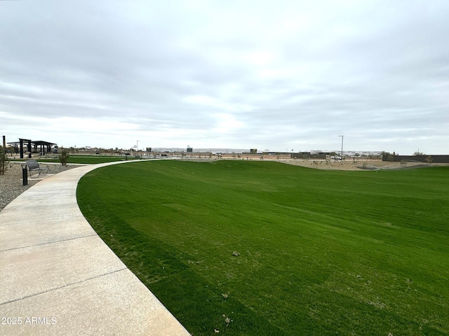 view of community with a lawn