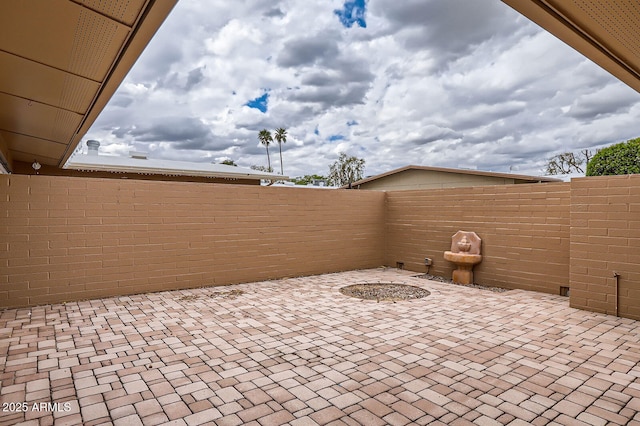 view of patio / terrace featuring a fenced backyard