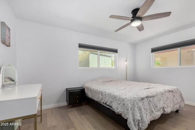 855 S Revolta Cir, Mesa, AZ 85208 - bedroom featuring baseboards, light wood-style floors, and ceiling fan