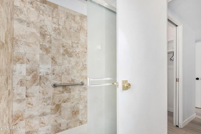 855 S Revolta Cir, Mesa, AZ 85208 - full bath featuring baseboards, tiled shower, and wood finished floors