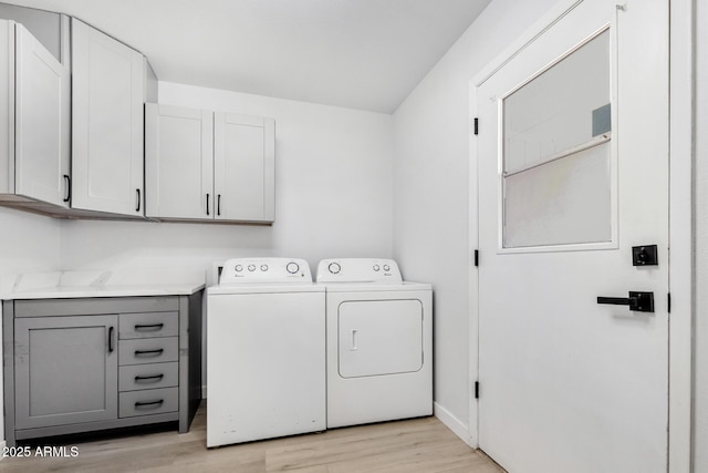 855 S Revolta Cir, Mesa, AZ 85208 - washroom with light wood-style floors, separate washer and dryer, and cabinet space