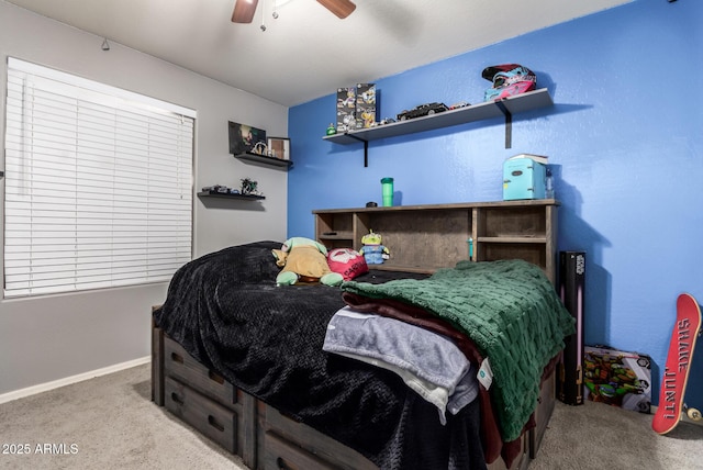 bedroom featuring light carpet and ceiling fan