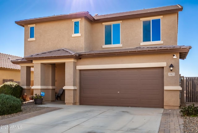 view of front of property featuring a garage