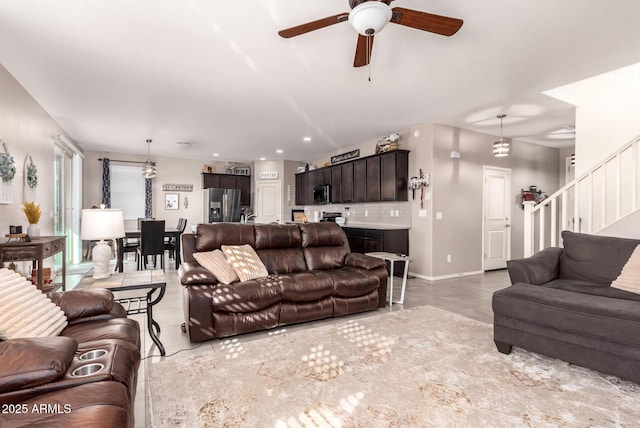 living room with ceiling fan