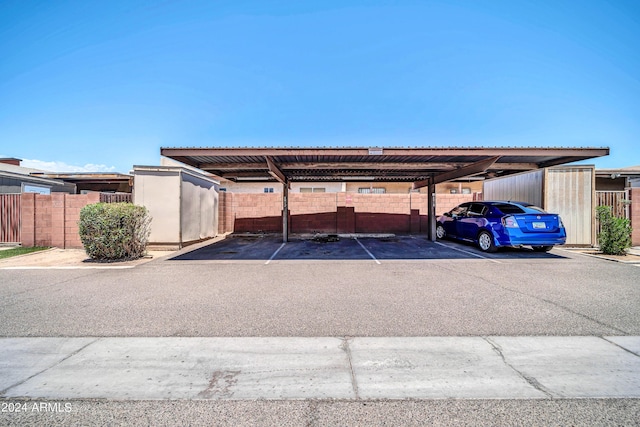 view of parking featuring a carport