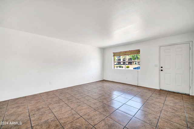 view of tiled spare room