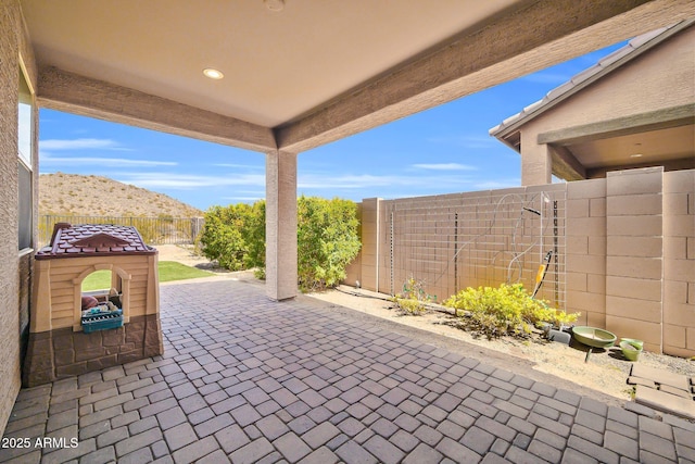 view of patio with a fenced backyard