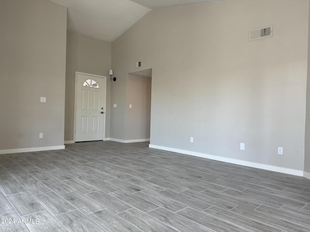 interior space featuring high vaulted ceiling