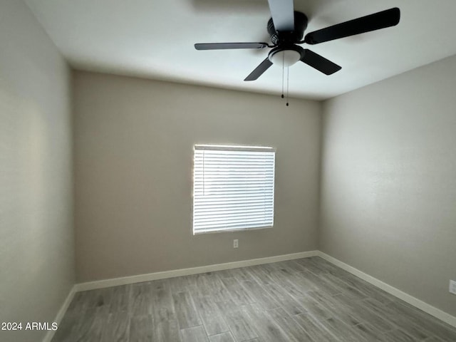 unfurnished room with light hardwood / wood-style floors and ceiling fan