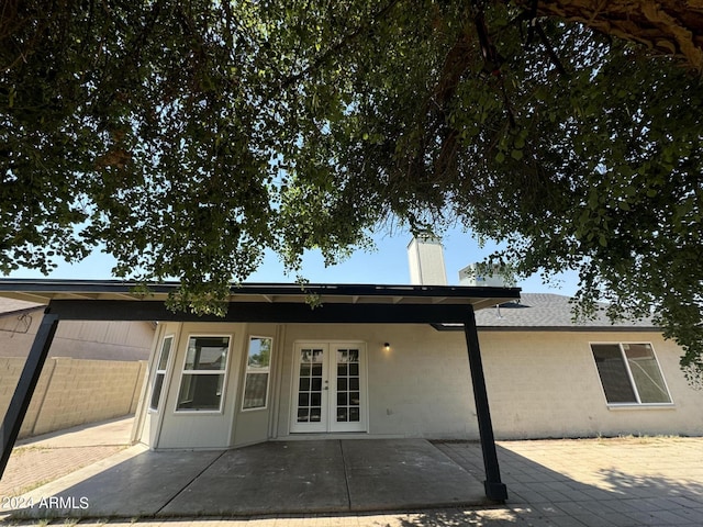 back of house with a patio