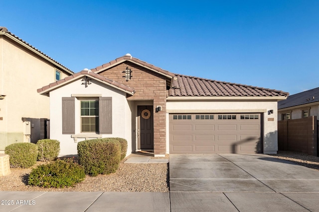 mediterranean / spanish-style home featuring a garage