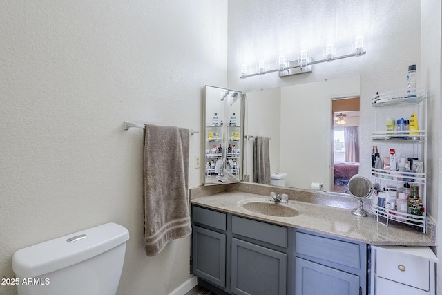 1331 W Baseline Rd Unit 360, Mesa, AZ 85202 - bathroom with vanity and a textured wall