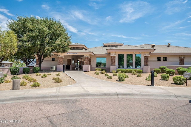 1331 W Baseline Rd Unit 360, Mesa, AZ 85202 - prairie-style house with stucco siding, stone siding, and a tile roof