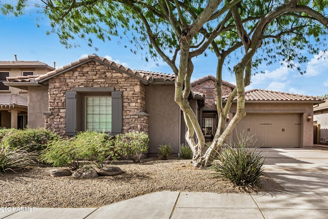 view of front of home with a garage