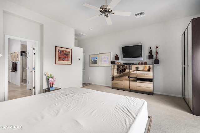 bedroom featuring ceiling fan and light colored carpet