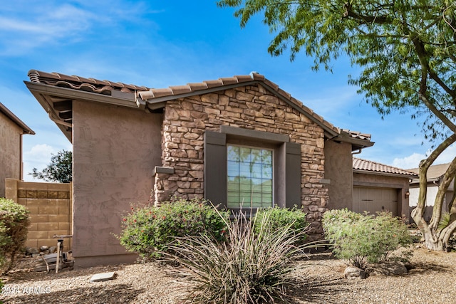 view of front of property featuring a garage