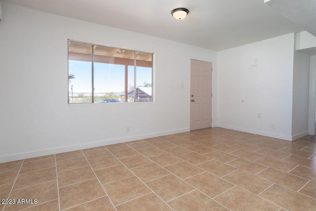 view of tiled empty room