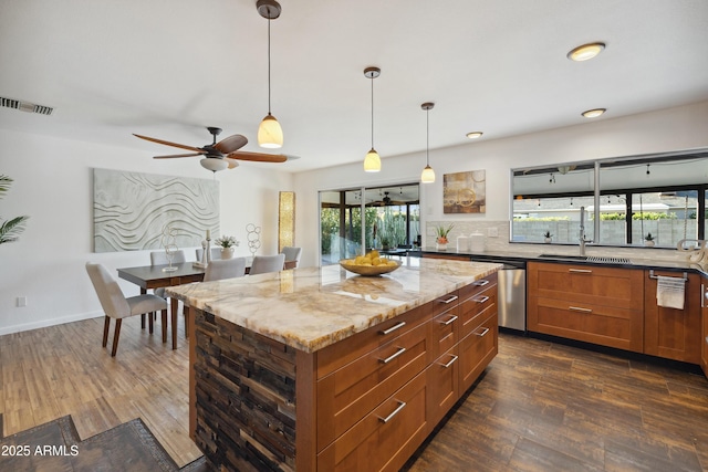 5802 E Spring Rd, Scottsdale, AZ 85254 - kitchen with stainless steel dishwasher, dark wood-style floors, and healthy amount of natural light
