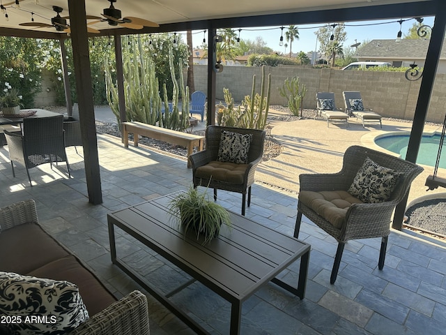 5802 E Spring Rd, Scottsdale, AZ 85254 - view of patio / terrace with outdoor dining space, a ceiling fan, and a fenced backyard