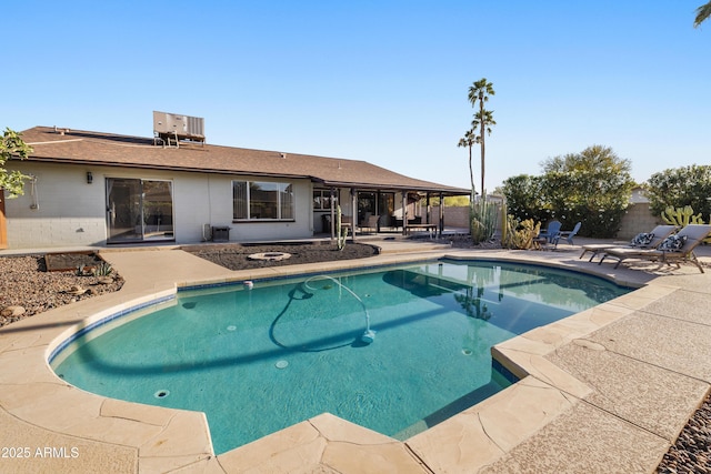 5802 E Spring Rd, Scottsdale, AZ 85254 - view of pool with a patio area, central AC unit, and fence