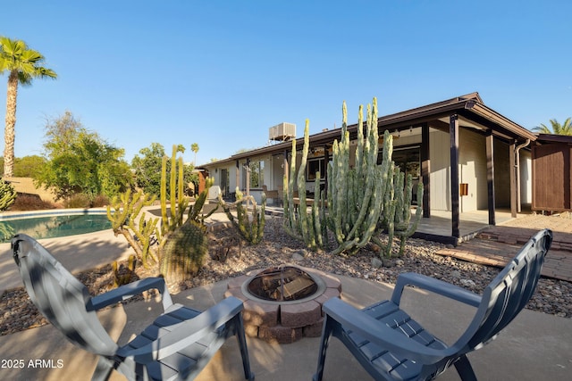 5802 E Spring Rd, Scottsdale, AZ 85254 - view of patio / terrace with an outdoor fire pit and an outdoor pool