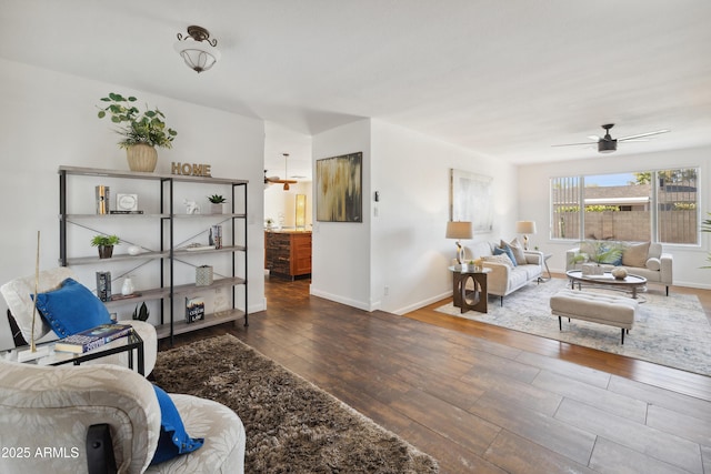 5802 E Spring Rd, Scottsdale, AZ 85254 - living room featuring wood finished floors, a ceiling fan, and baseboards