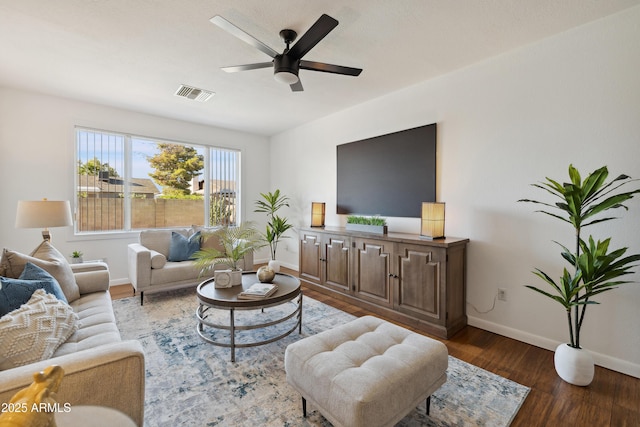 5802 E Spring Rd, Scottsdale, AZ 85254 - living area featuring wood finished floors, baseboards, and ceiling fan
