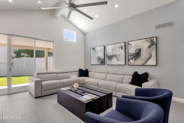 living room featuring beamed ceiling, high vaulted ceiling, ceiling fan, and light tile floors