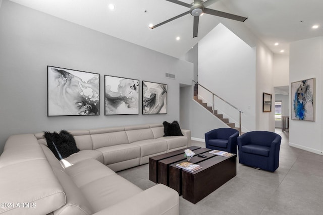 living room featuring high vaulted ceiling, tile flooring, and ceiling fan