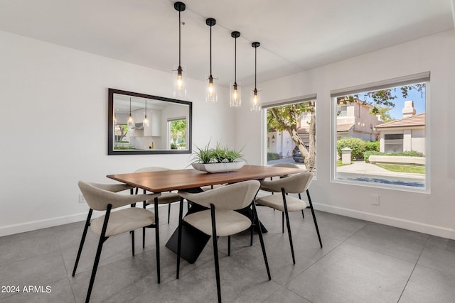 dining area featuring tile flooring