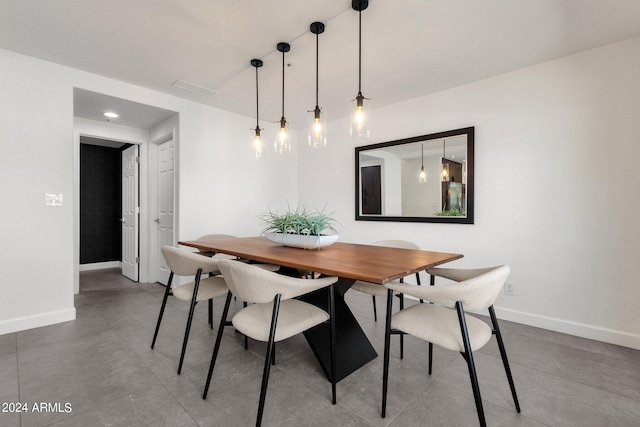 dining area featuring tile flooring