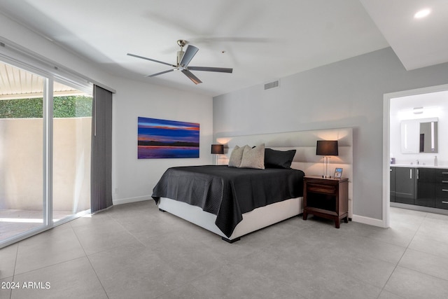 tiled bedroom featuring connected bathroom, ceiling fan, and access to exterior