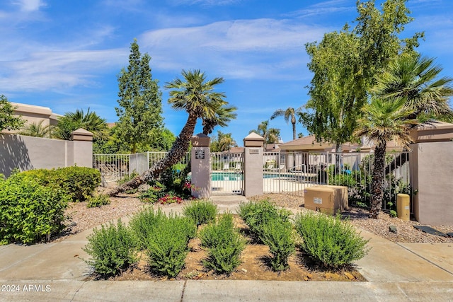 view of yard featuring a community pool