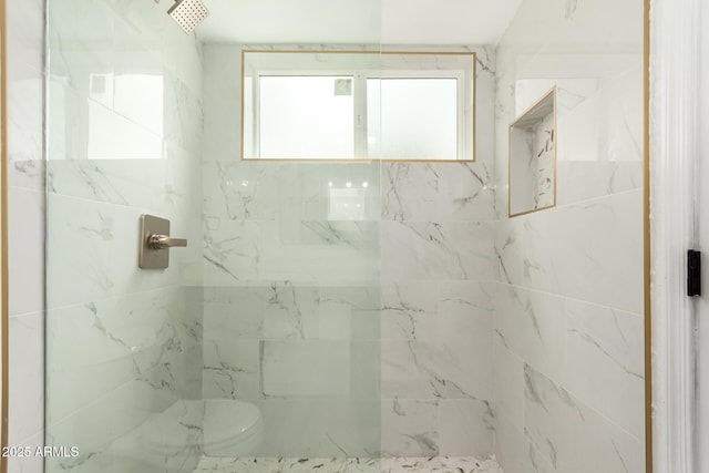 full bath with a marble finish shower