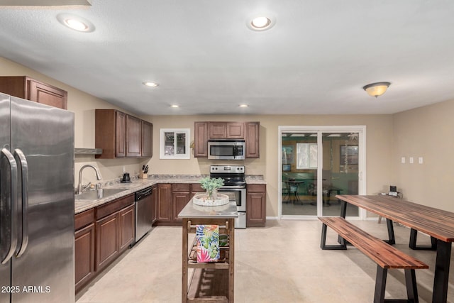 3643 E Friess Dr, Phoenix, AZ 85032 - kitchen with appliances with stainless steel finishes, a sink, and recessed lighting