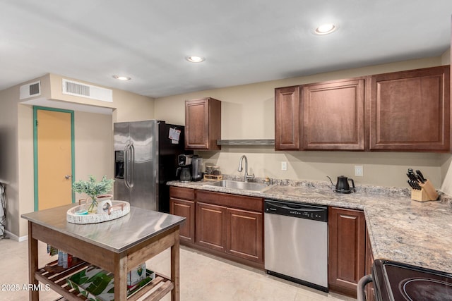 3643 E Friess Dr, Phoenix, AZ 85032 - kitchen featuring stainless steel appliances, a sink, light countertops, recessed lighting, and light tile patterned floors