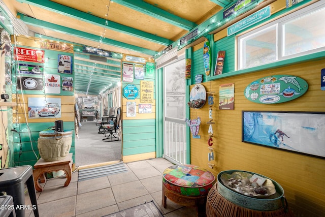 3643 E Friess Dr, Phoenix, AZ 85032 - misc room featuring tile patterned flooring and wooden walls